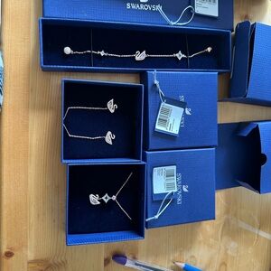 Authentic Swarovski Rose Gold Swan necklace, and bracelet